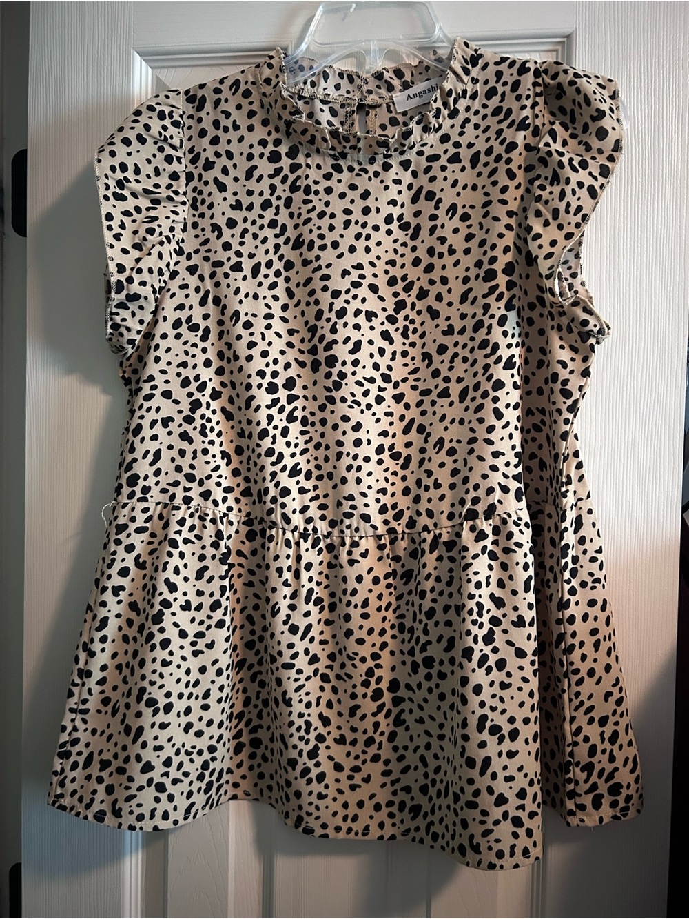 Aprecia Beige and Black Dotted Peplum Top